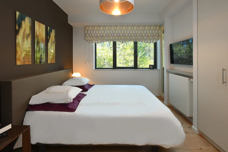 Chambre d'un appartement de la Résidence Valentine
